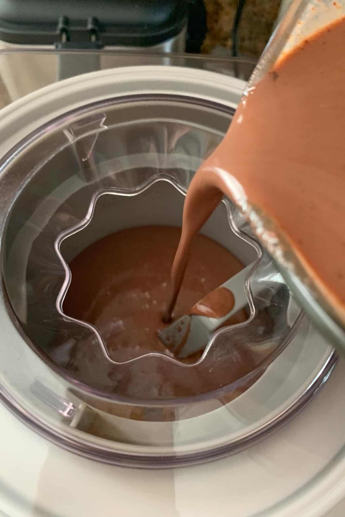 pouring ice cream base into machine