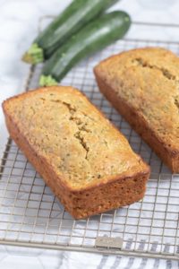 zucchini bread loaves on cooling rack