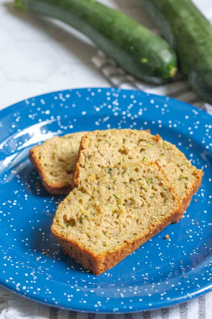 slices of zucchini bread on blue plate