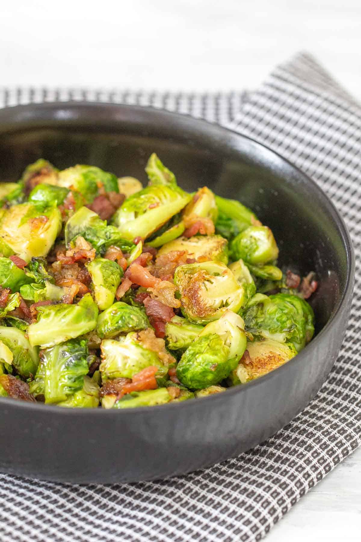 maple bacon brussels sprouts in serving bowl