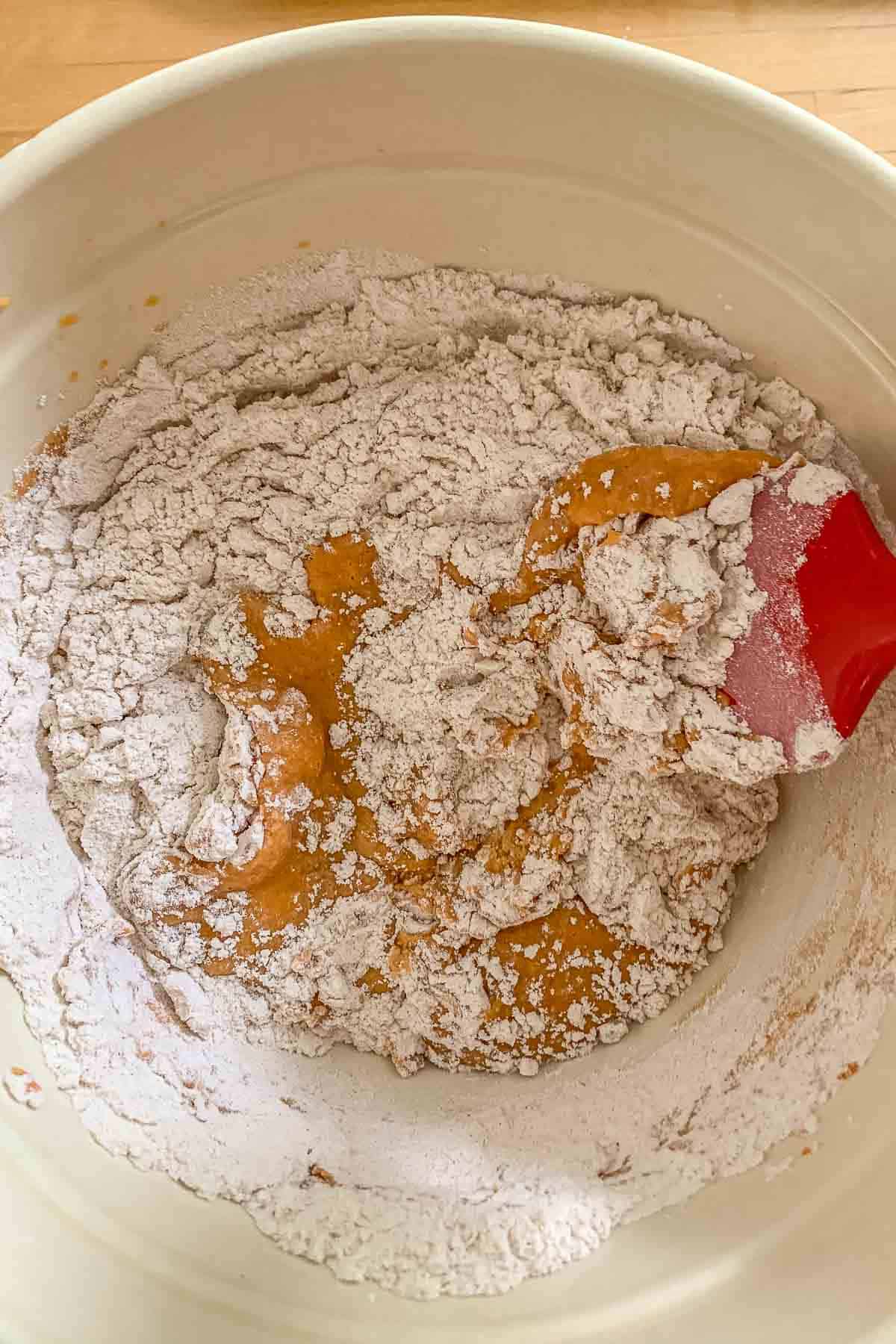 mixing pumpkin coffee cake batter