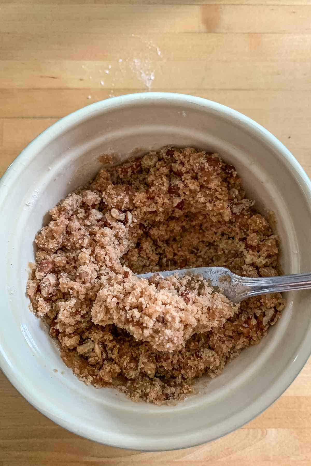 mixing streusel topping for coffee cake