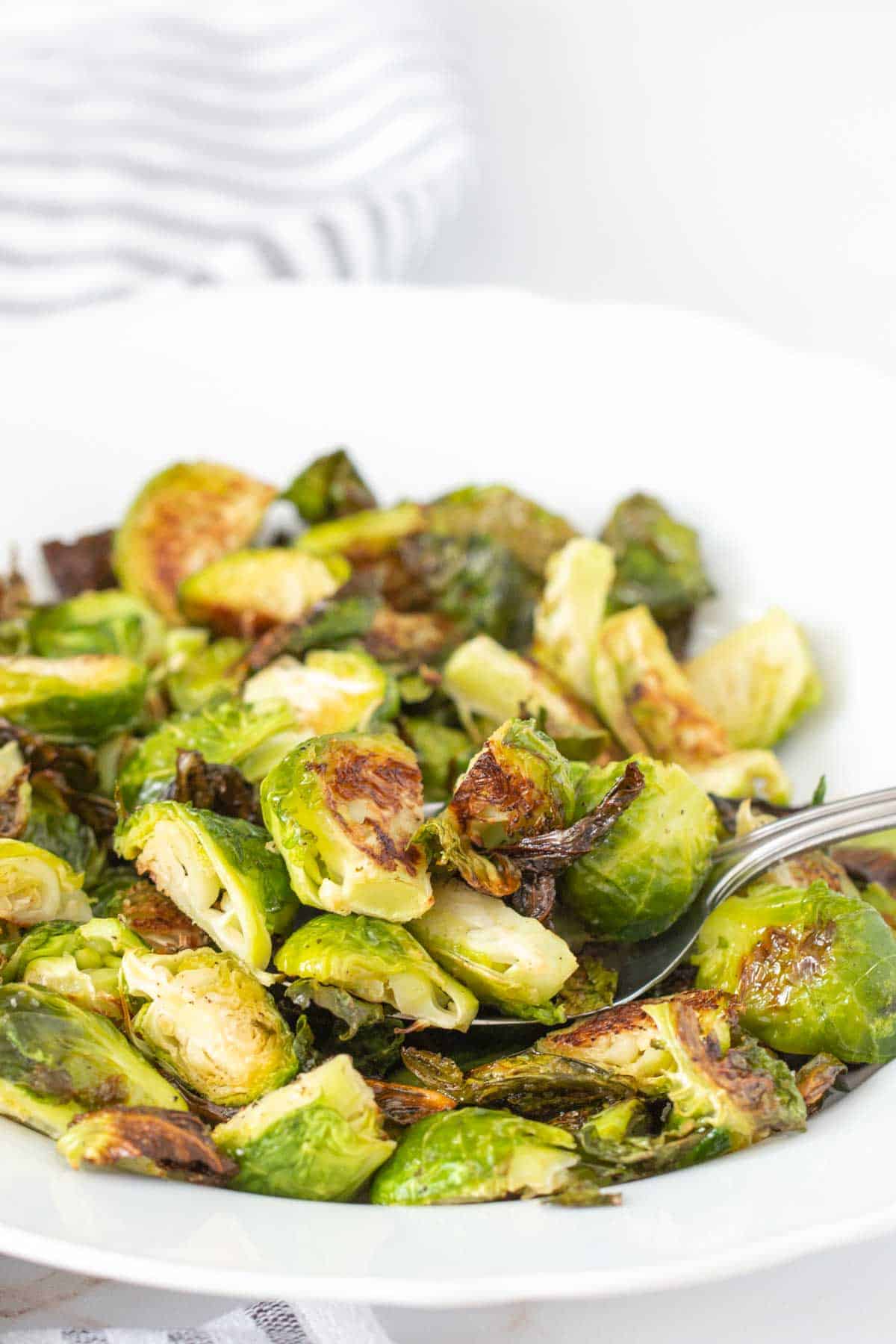 roasted brussels sprouts in serving bowl