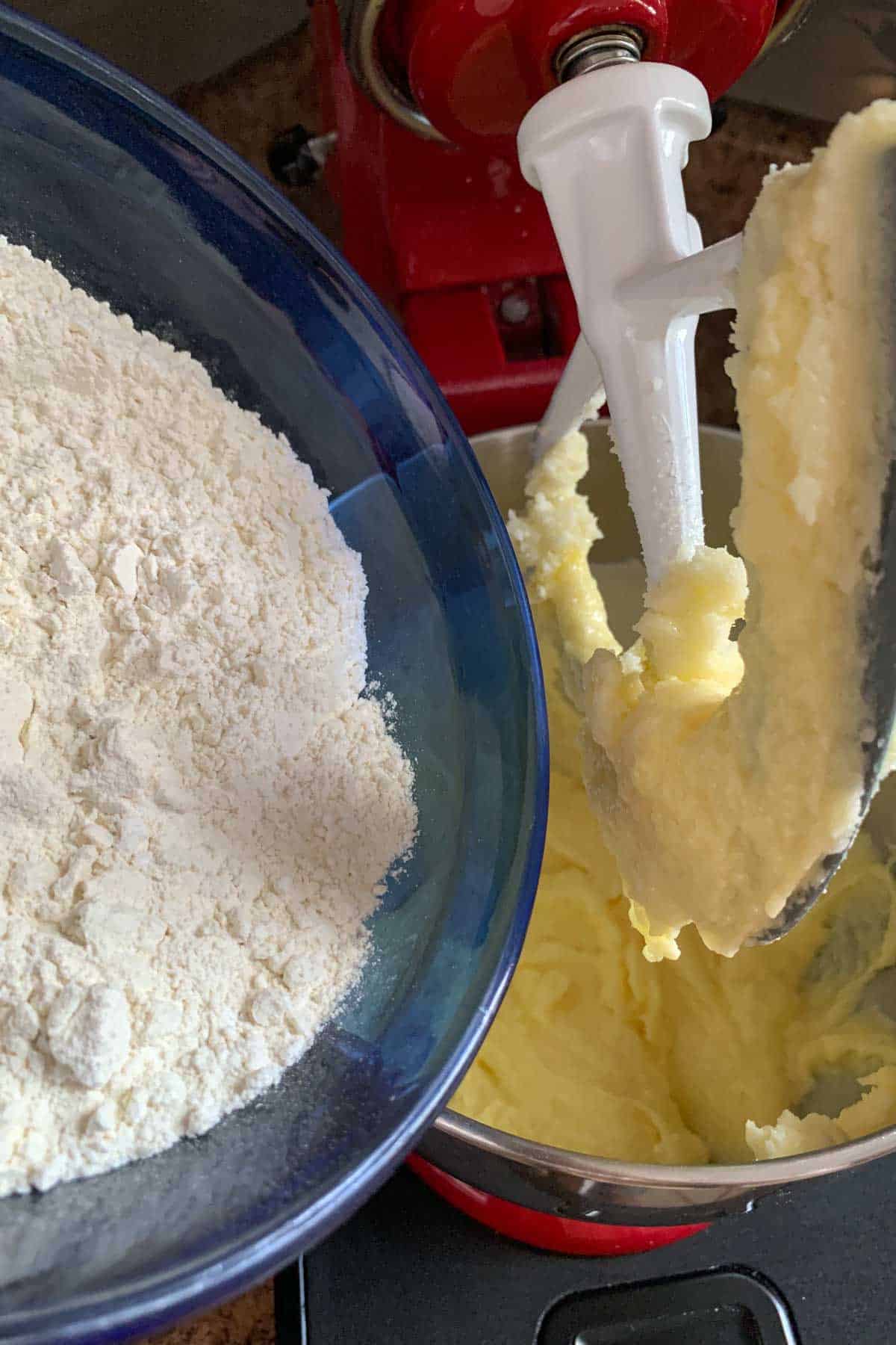 adding flour to cookie dough