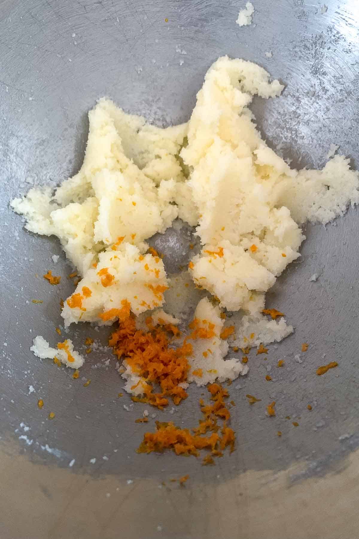 orange zest on creamed butter and sugar