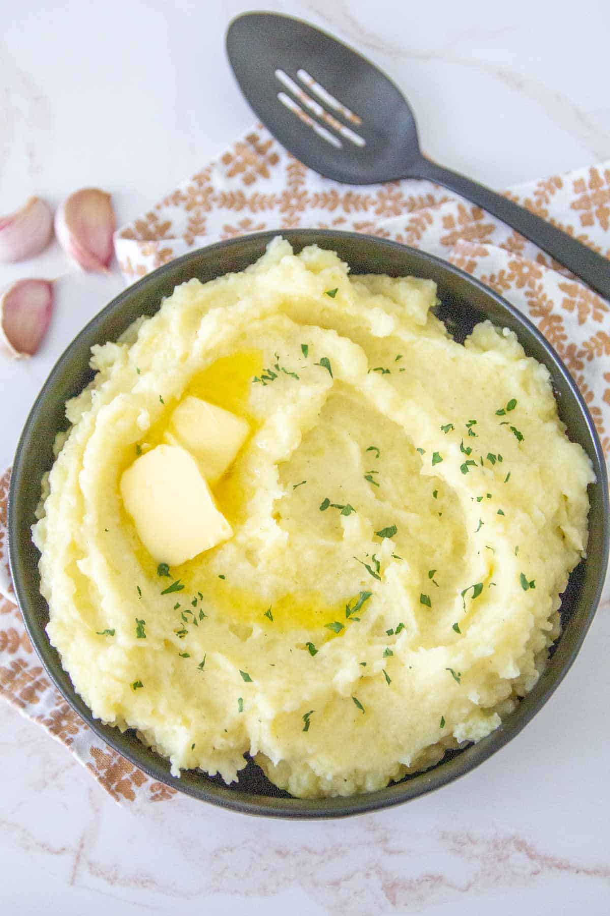 overhead bowl of garlic mashed potatoes