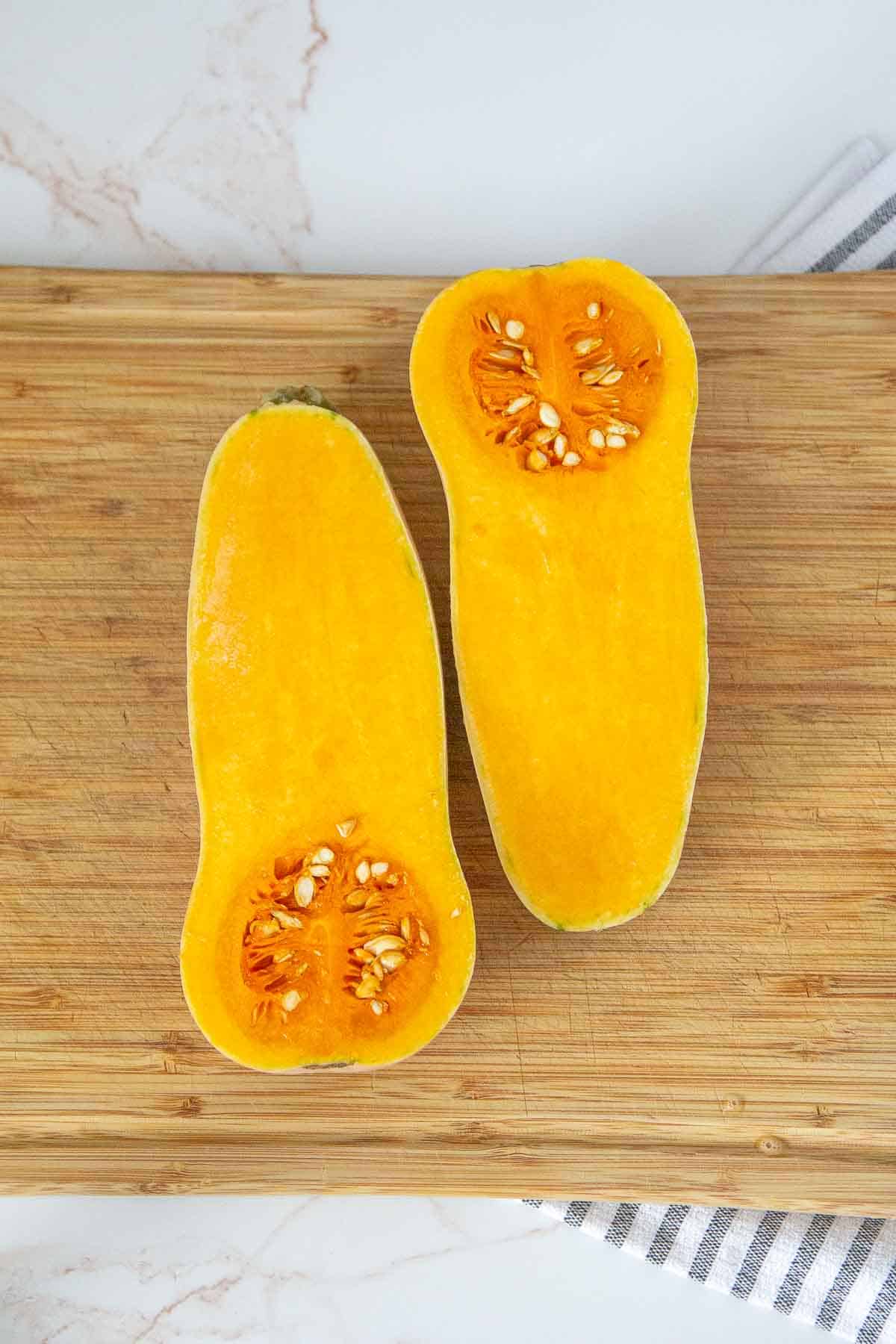 vertically halved butternut squash