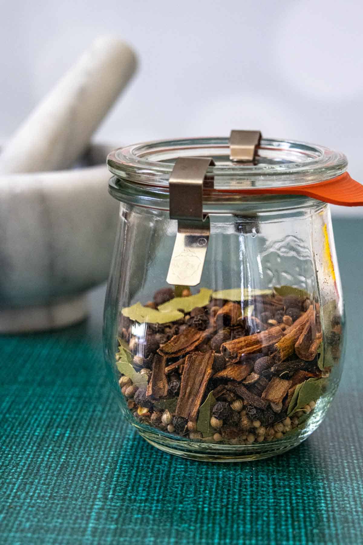 pickling spice in a glass jar