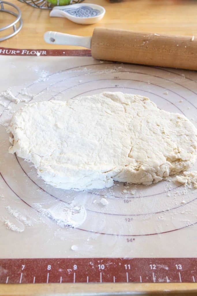 Biscuit dough shaped into a rectangle.