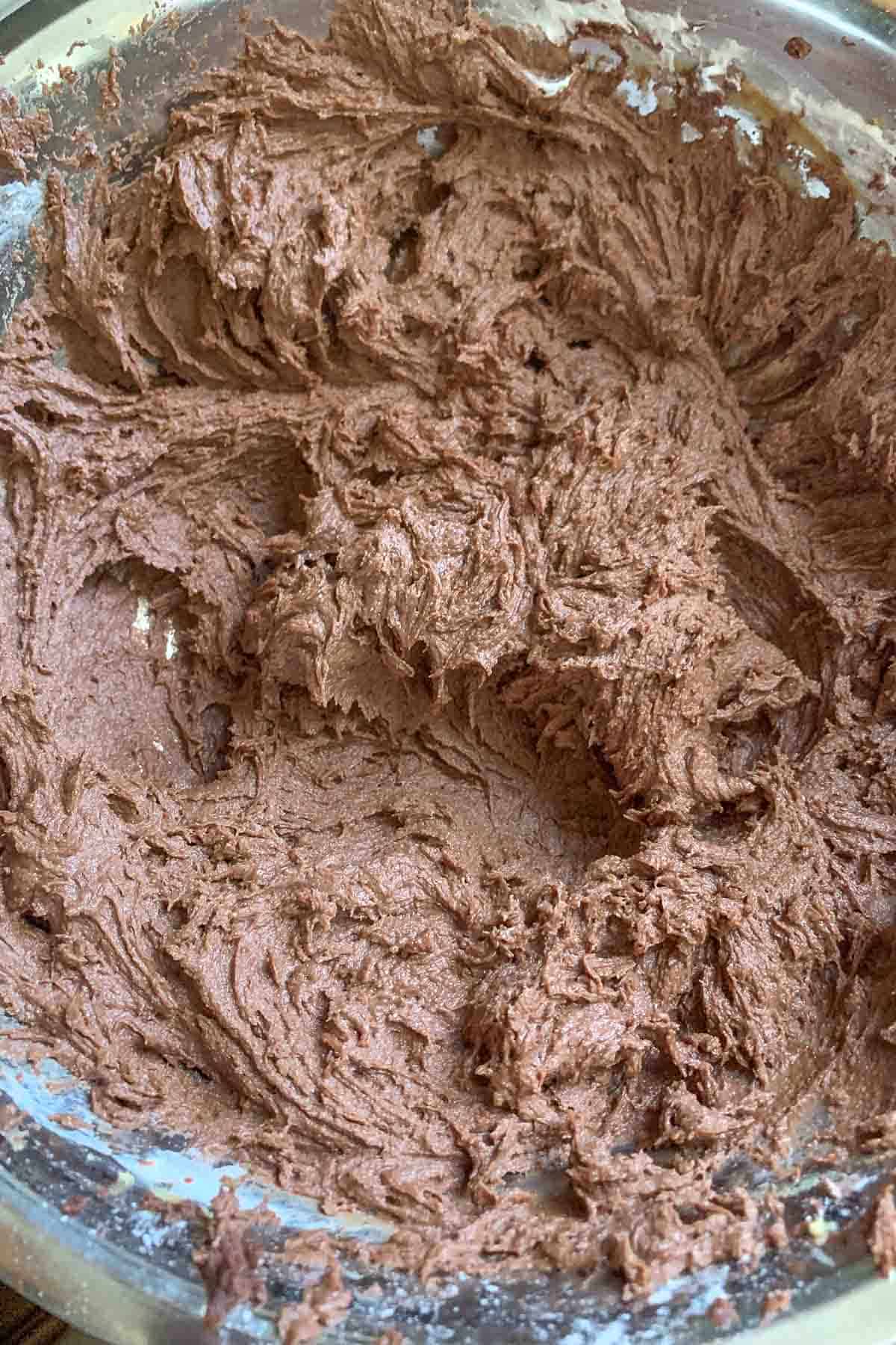 Chocolate peanut butter pie filling in a mixing bowl.