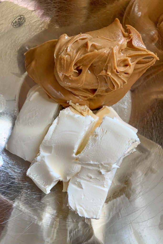 Peanut butter, cream cheese, and vanilla in a mixing bowl.