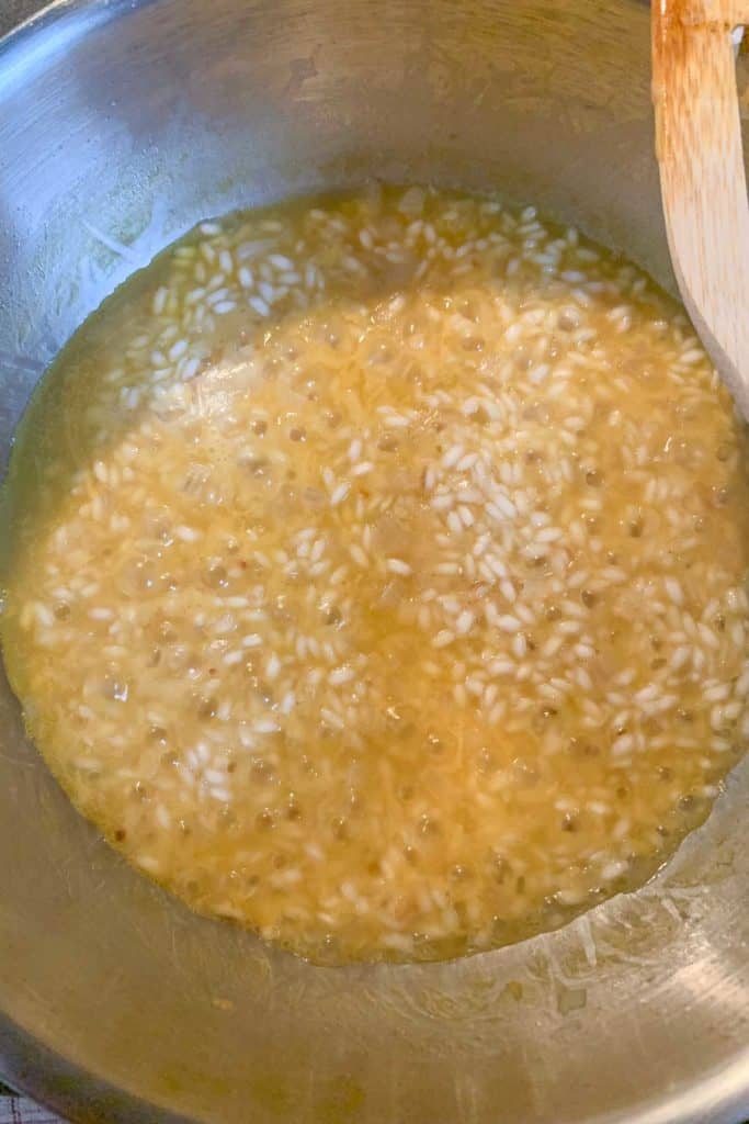 Risotto cooking in a pan.