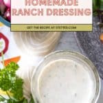 A glass jar of ranch dressing sits on a table with fresh parsley, radishes, and salad greens nearby. Text overlay reads "Homemade Ranch Dressing.