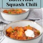 Bowl of butternut squash chili served with sour cream.