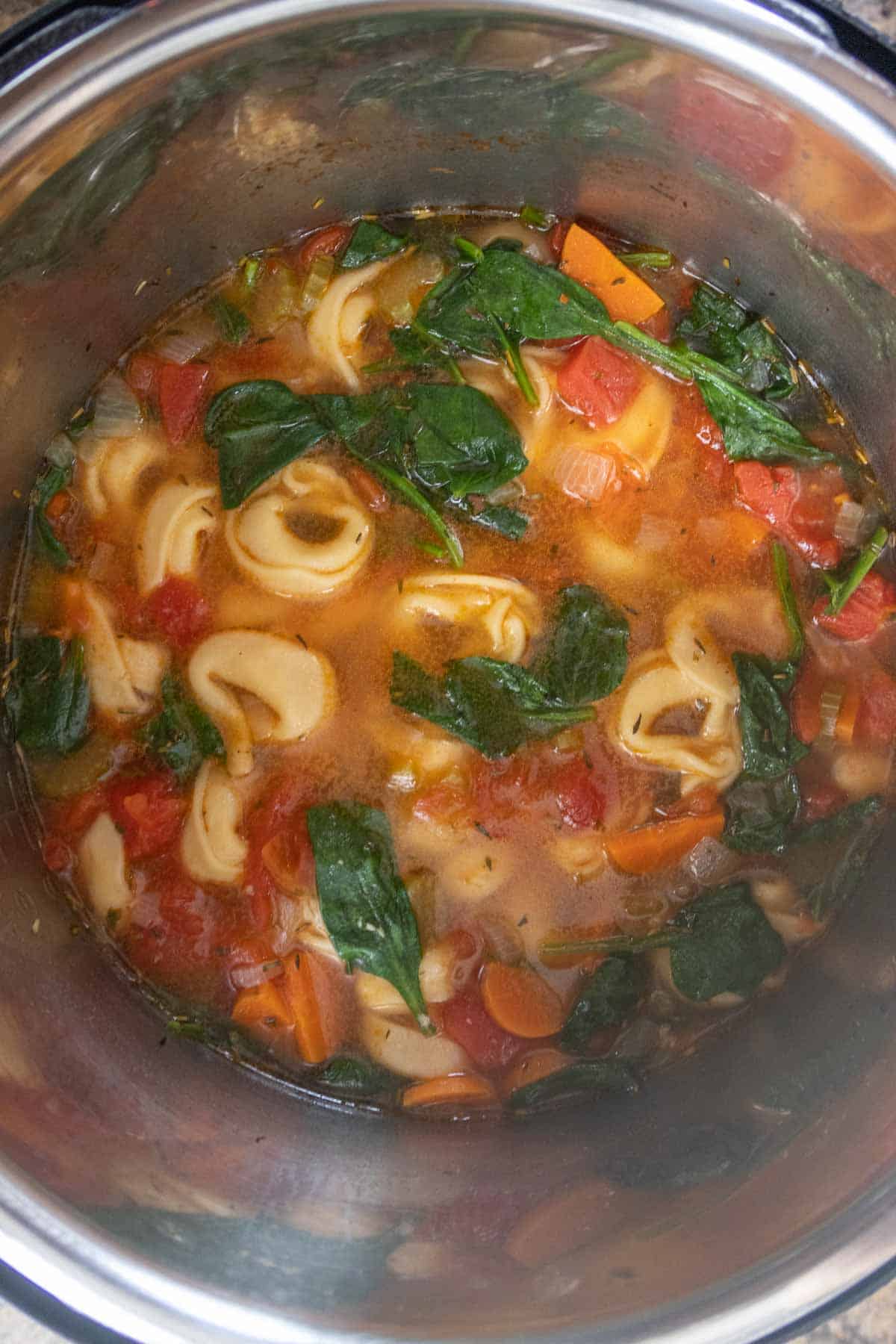 Instant pot filled with tortellini soup.