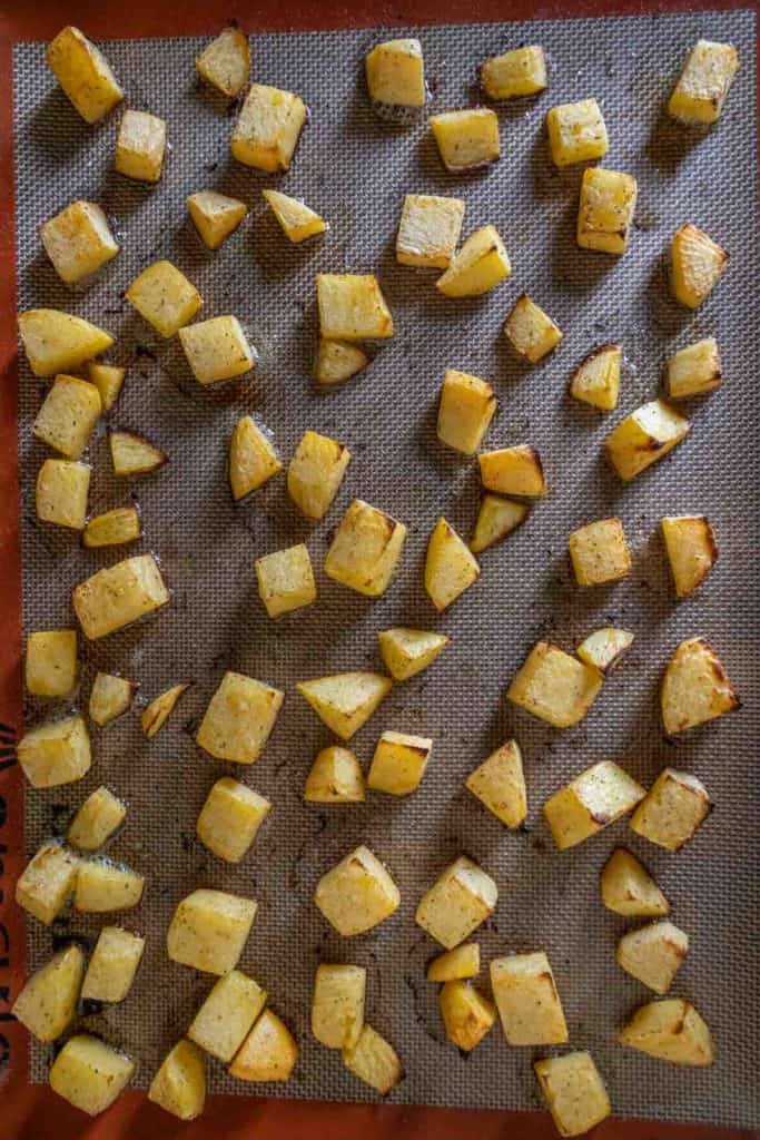 Roasted rutabaga on a sheet pan.