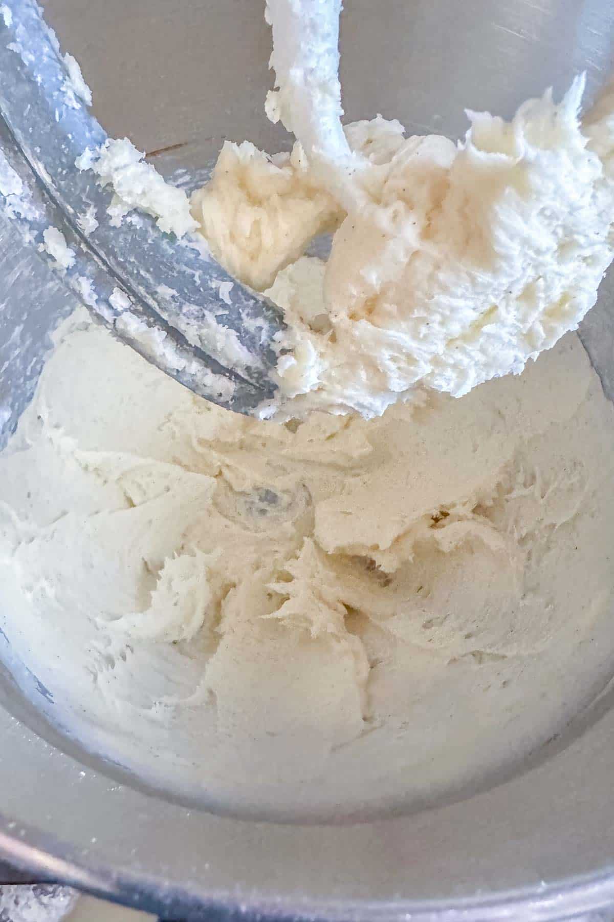 Butter, powdered sugar, and vanilla paste beaten together in a mixing bowl.