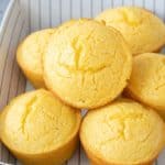 Baked corn muffins in a serving dish.