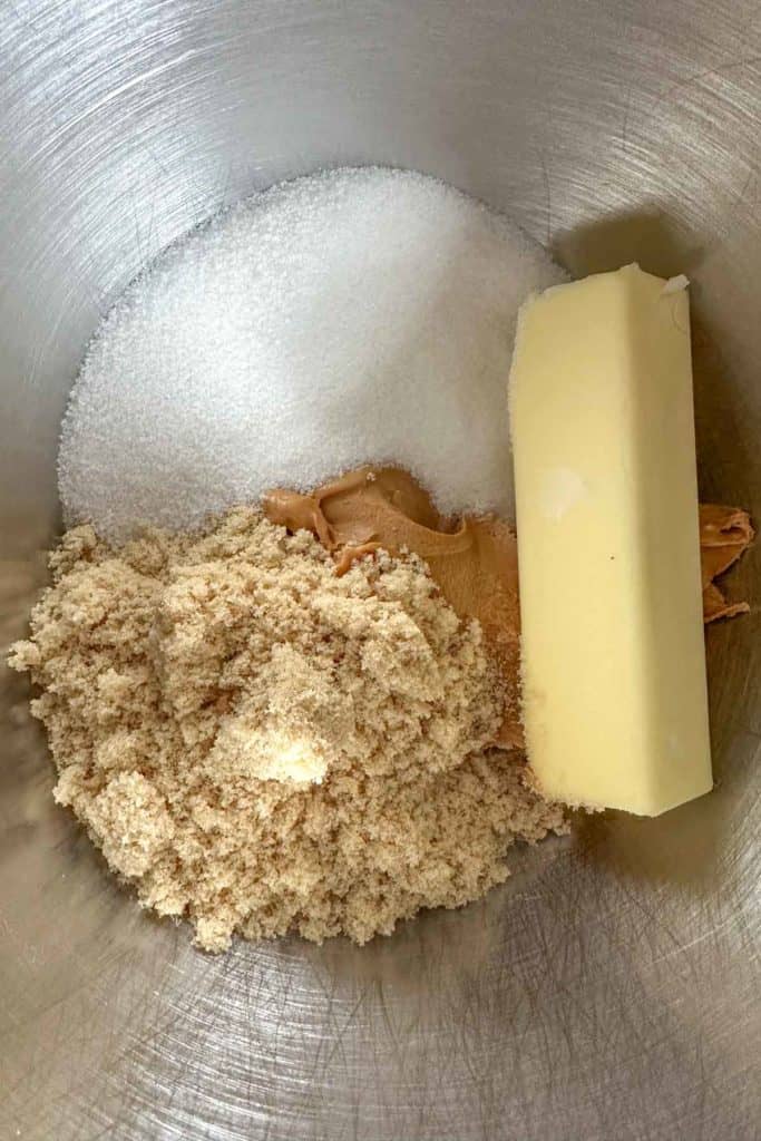 Sugars and butters in a mixing bowl before mixing.