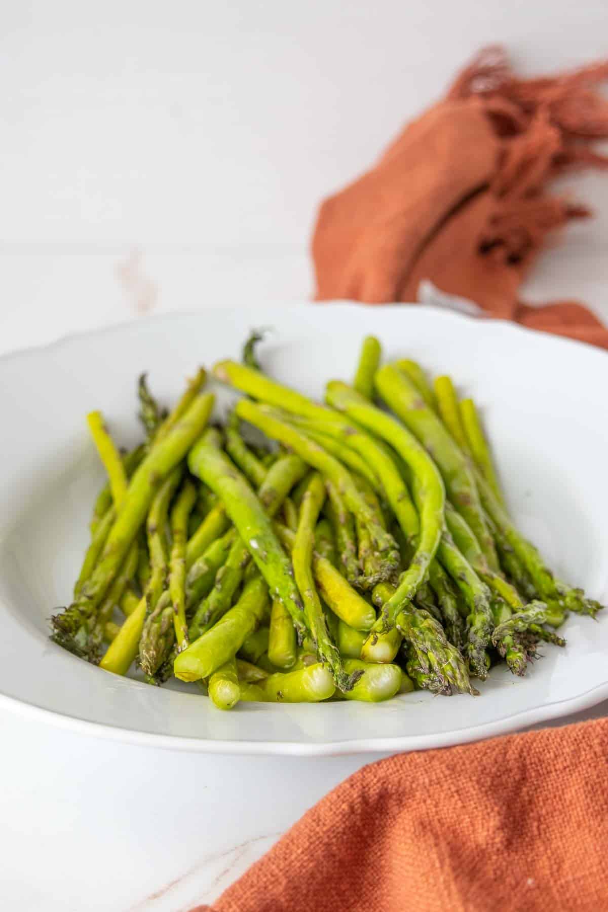 Serving platter of roasted asparagus.