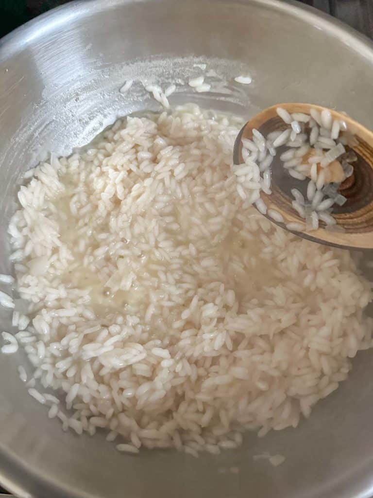 Cooking risotto on the stove.