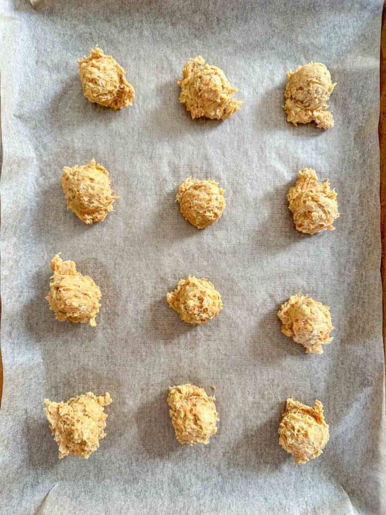 Carrot cake cookie dough on a sheet pan.