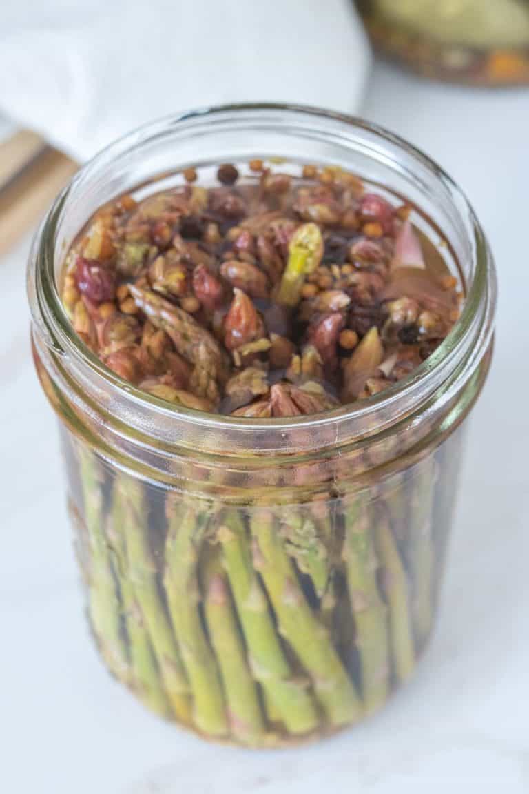 Jar of pickled asparagus.