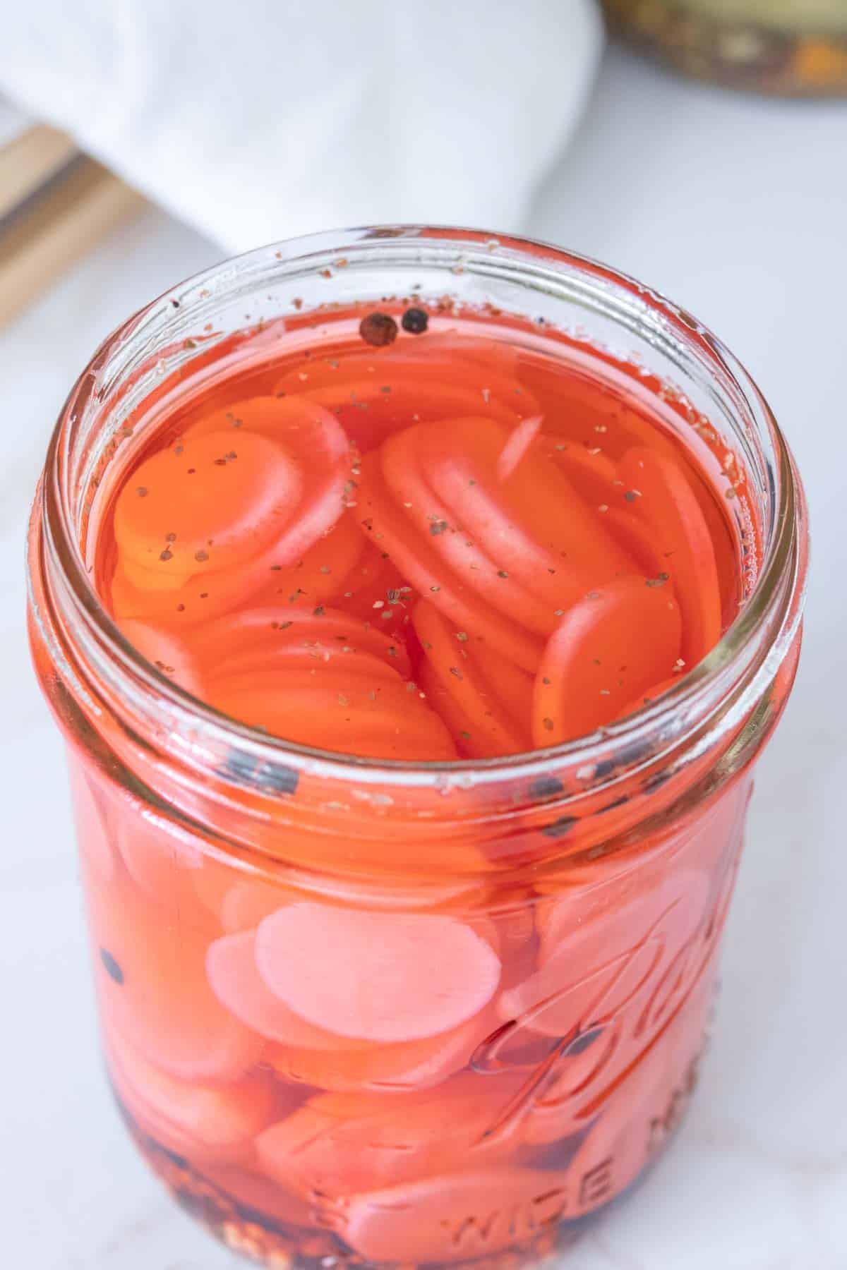 Jar of pickled radishes.