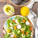 Spinach salad with avocado dressing.