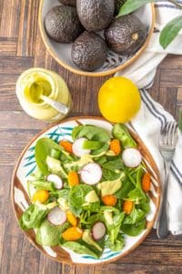 Spinach salad with avocado dressing.