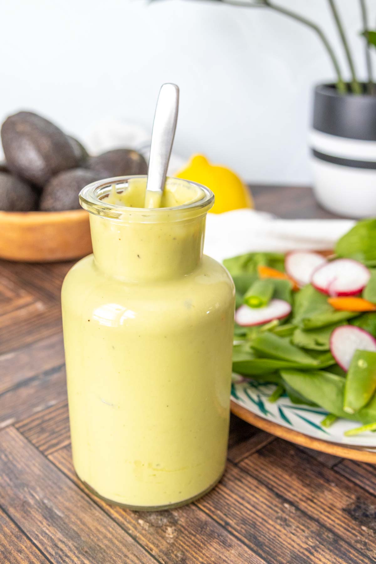 Avocado dressing in a bottle.