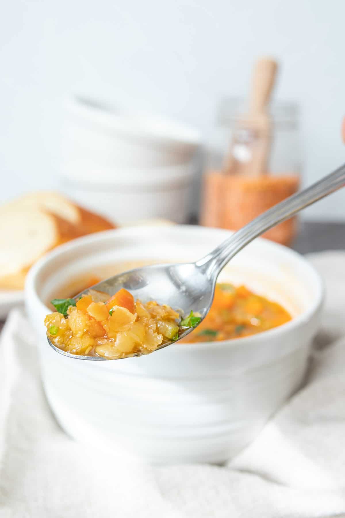 Spoonful of red lentil soup.