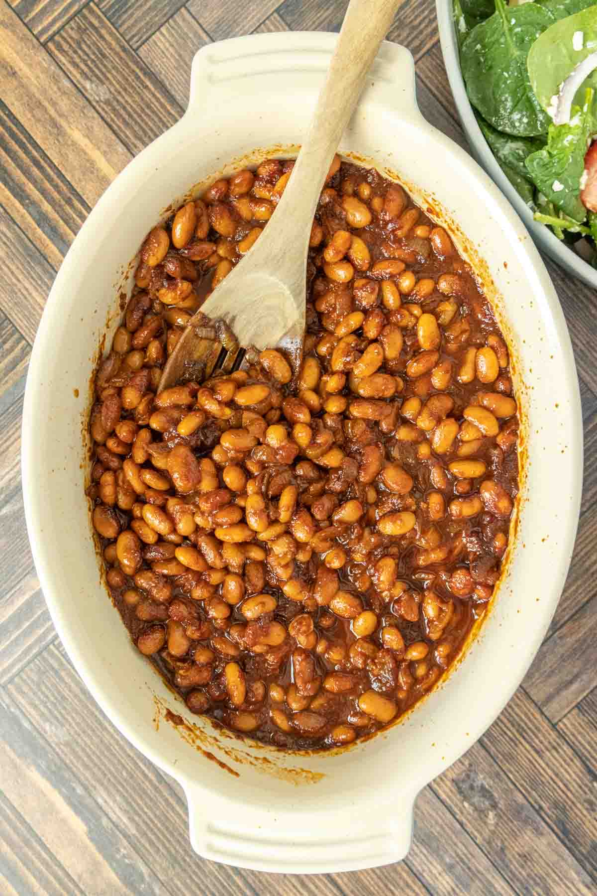 Overhead of vegetarian baked beans in a baking dish.