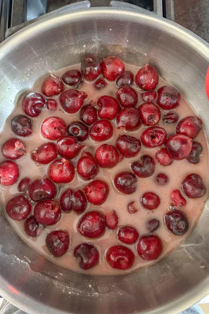 Cherries added to cornstarch sugar slurry for pie crust.