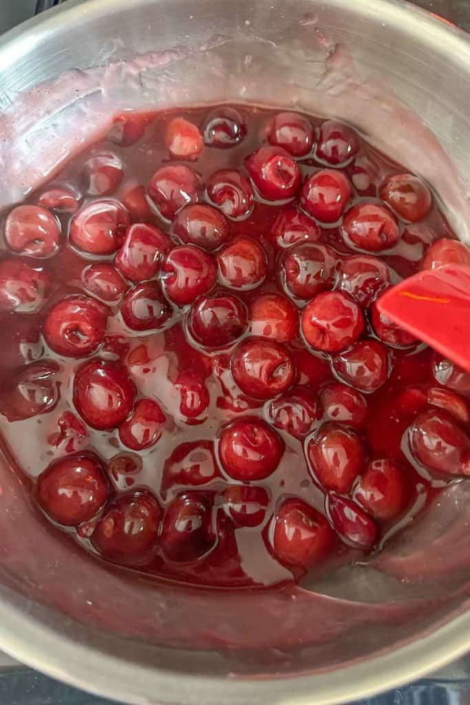 Cherry pie filling cooking down.