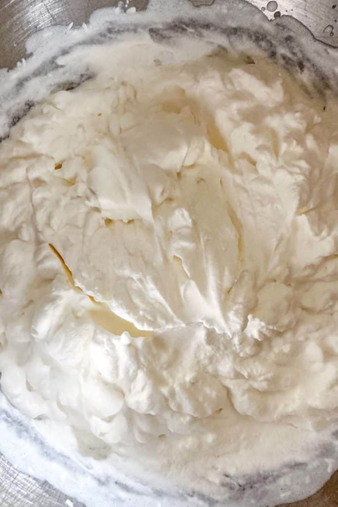 Whipped cream in a bowl.