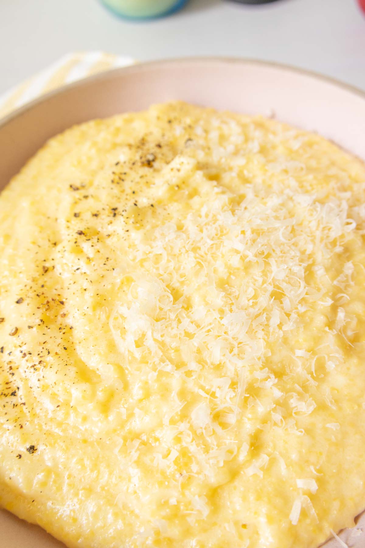 Close up of bowl of cheesy polenta.