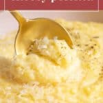 A gold spoon scoops creamy, cheesy polenta topped with grated cheese and black pepper; the words "cheesy polenta" appear at the top, highlighting this comforting dish.