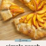 A peach galette sits sliced on a wooden board, its golden crust and neatly arranged peach slices inviting you to enjoy this simple peach galette.