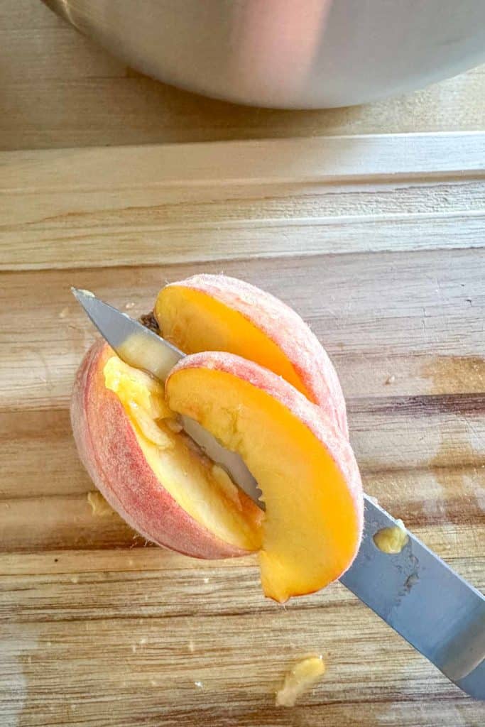 Slicing a peach.
