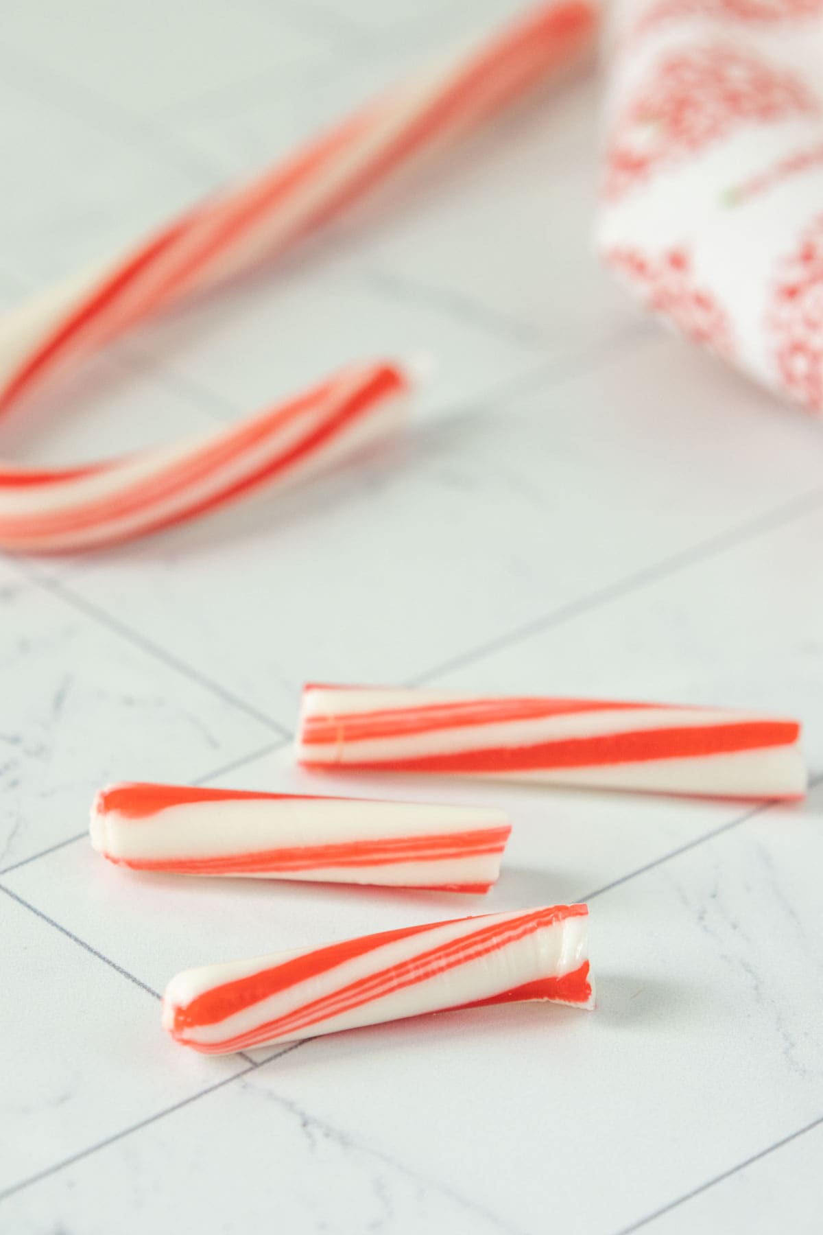 Candy canes on a white table.