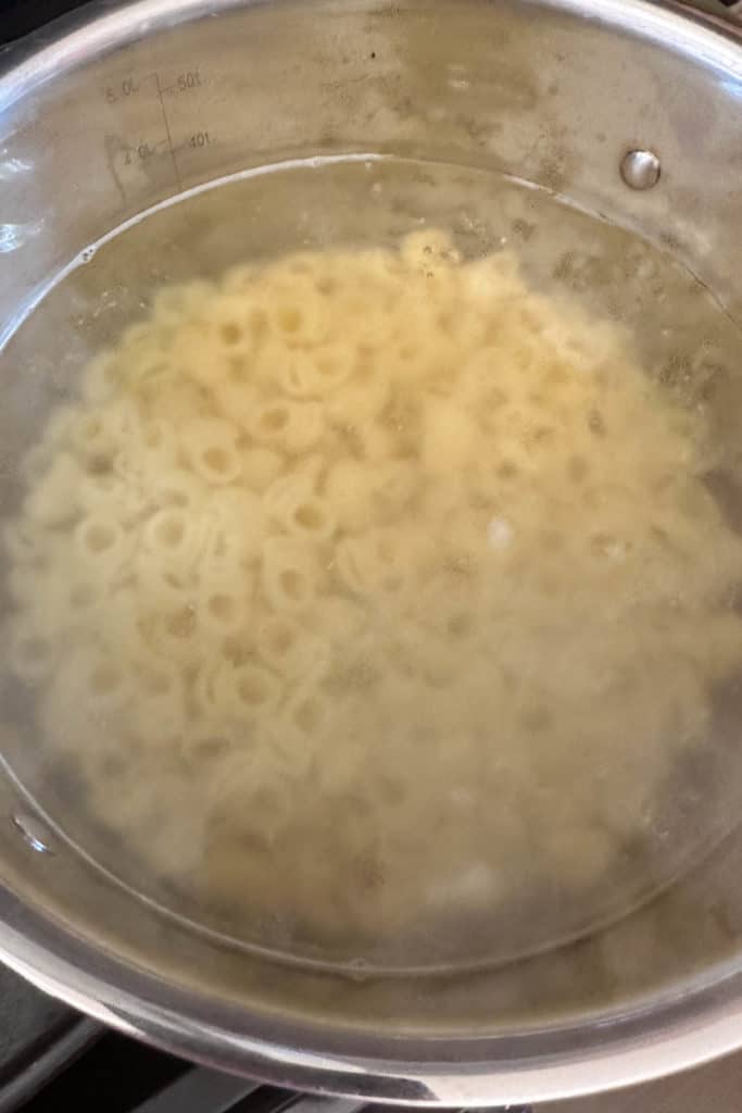 Cooking pasta in a pot.