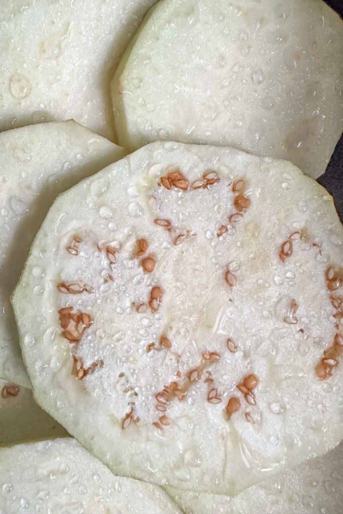 Water droplets on salted eggplant slices.