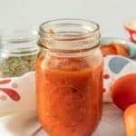 Homemade pizza sauce in a mason jar.