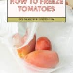Three tomatoes sit in a resealable plastic bag on a countertop, ready to demonstrate how to freeze tomatoes. Whole tomatoes and a baking sheet appear in the background. Text overlay reads "How to Freeze Tomatoes.