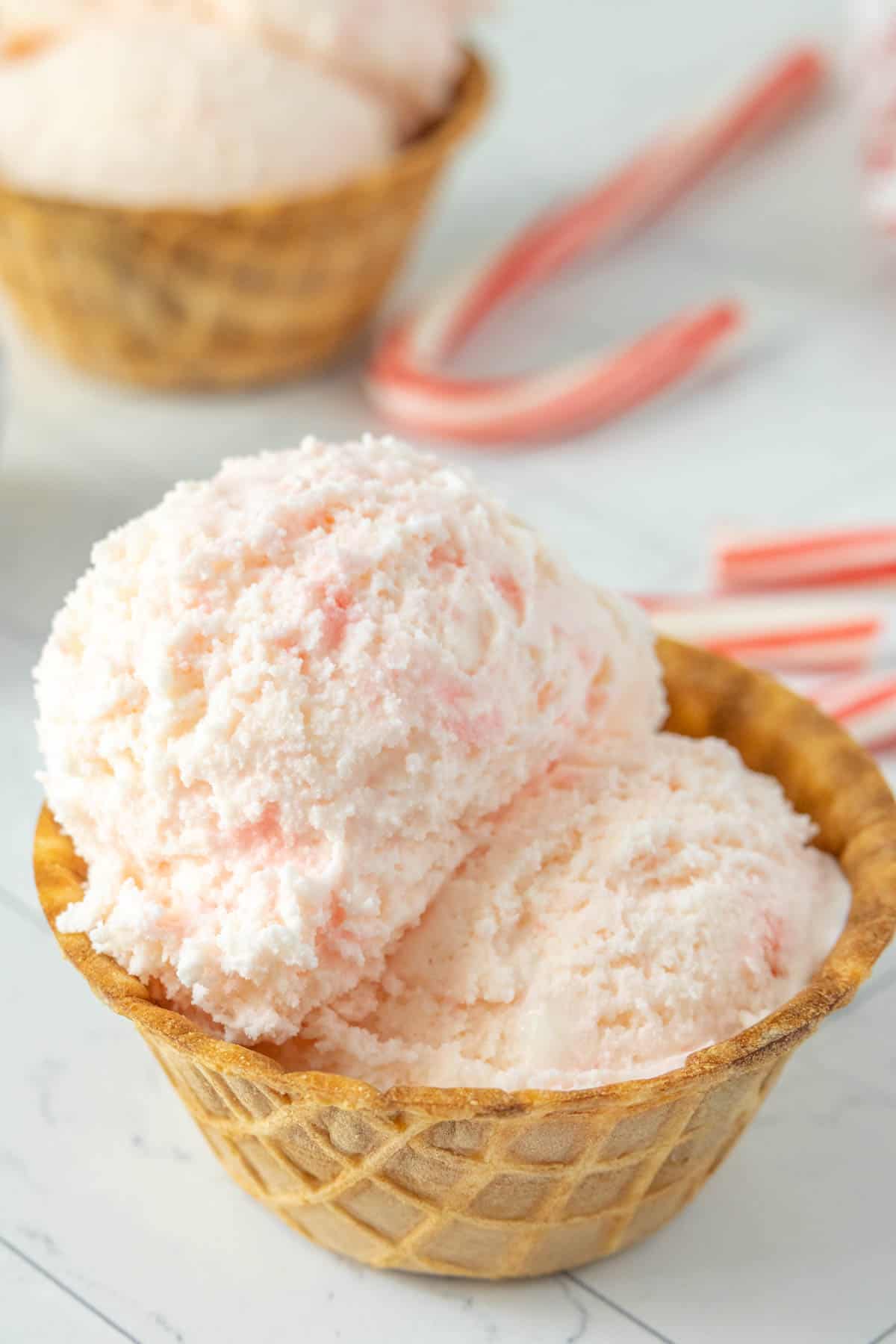 Two bowls of peppermint ice cream.