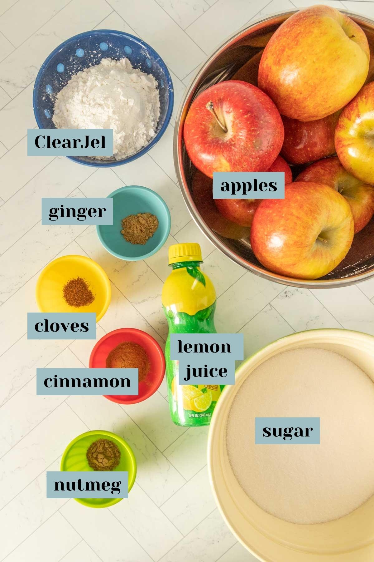 The ingredients for apple pie filling are laid out on a table.