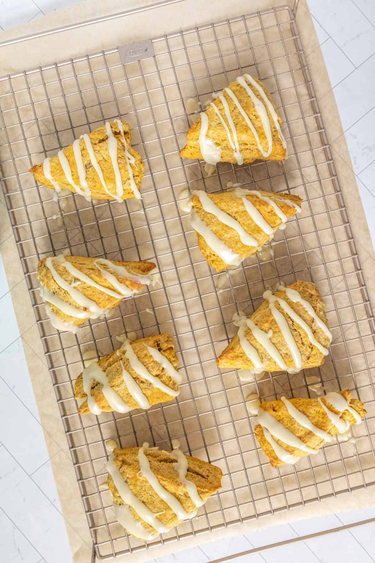 Pumpkin scones on a cooling rack.