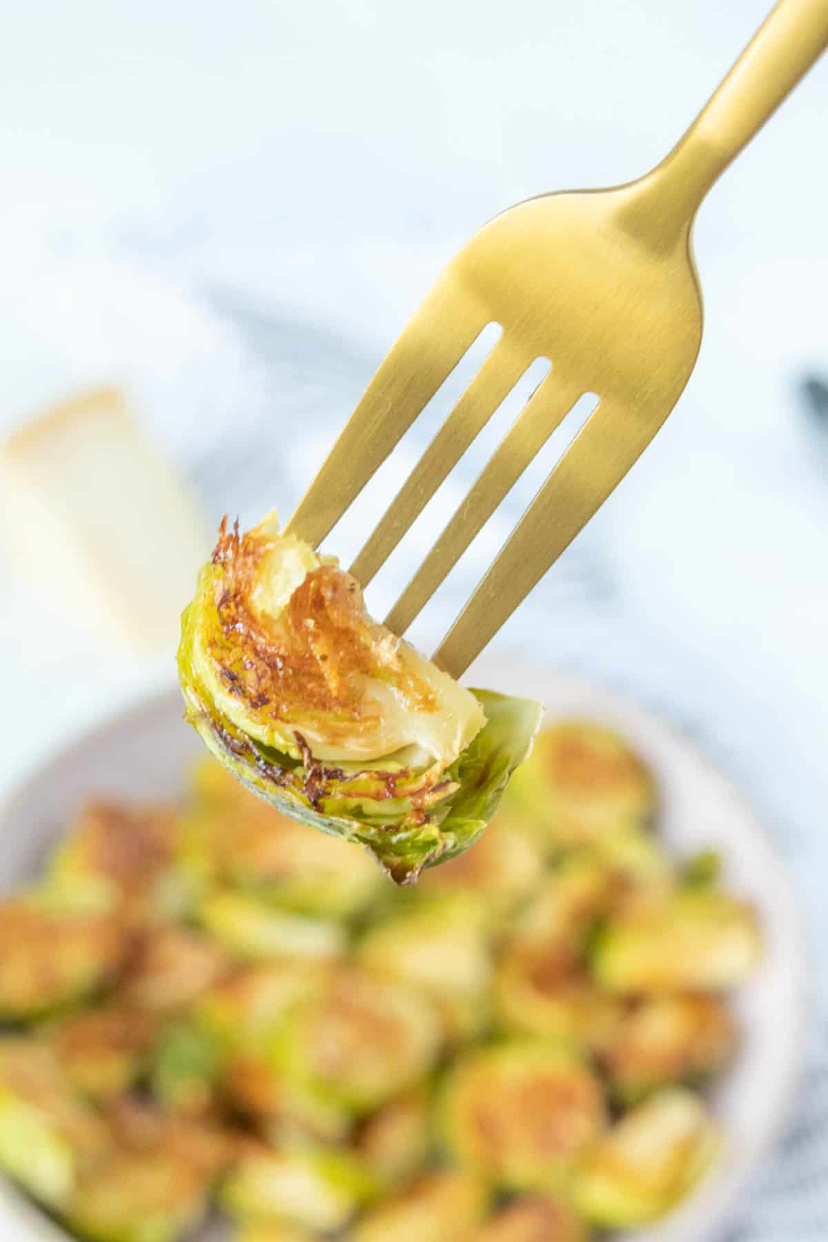 Brussels sprouts on a fork.