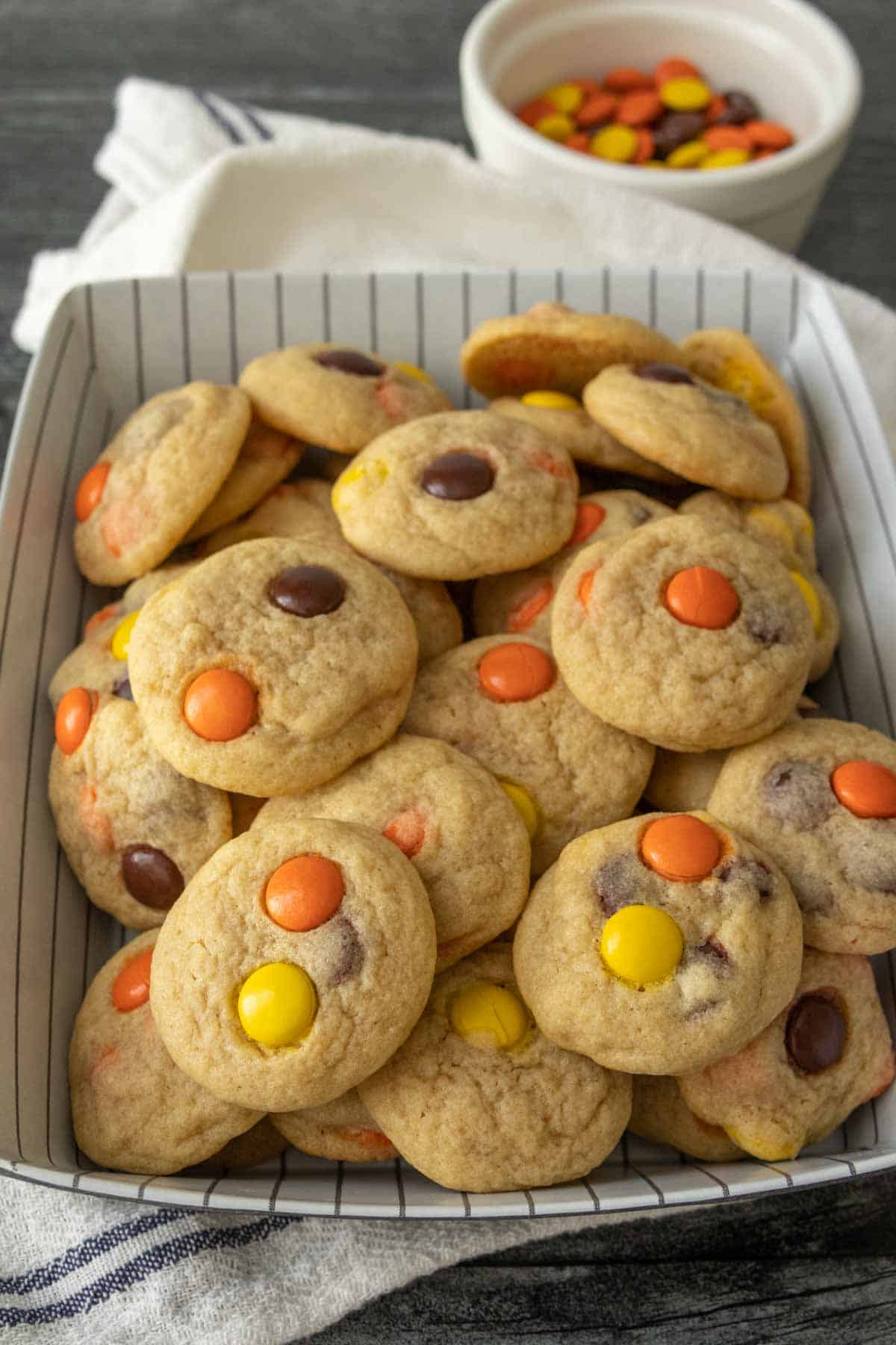 A plate of cookies with Reese's Pieces.